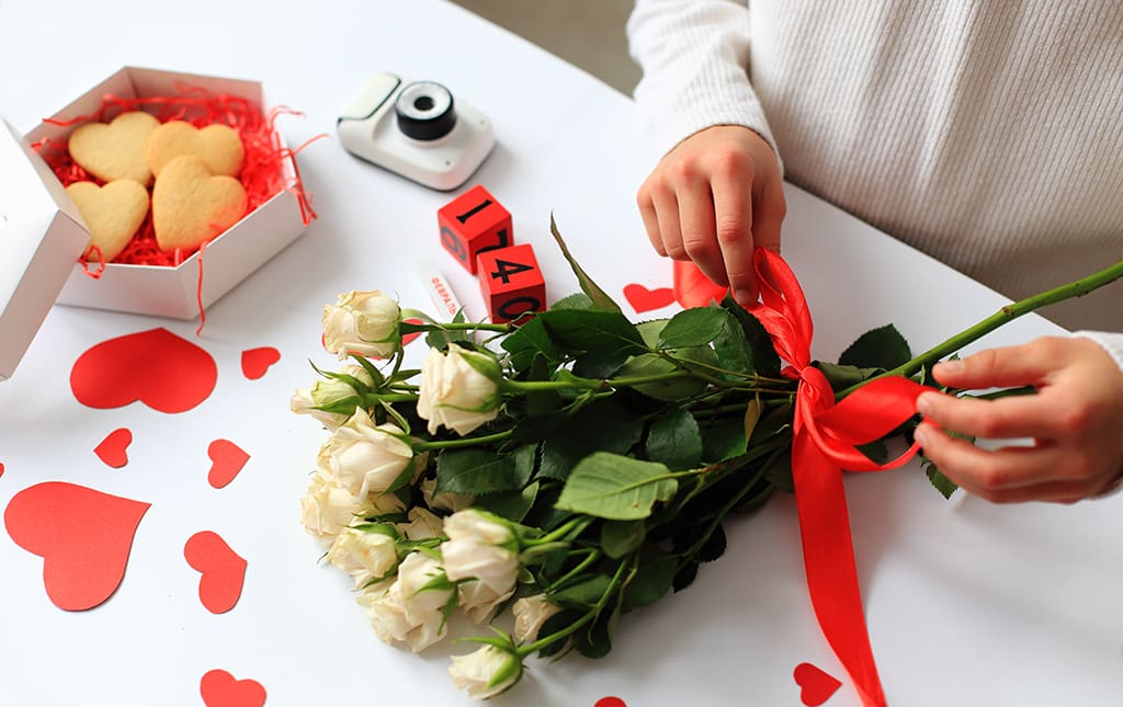 White roses and baked goods for Valentine's Day