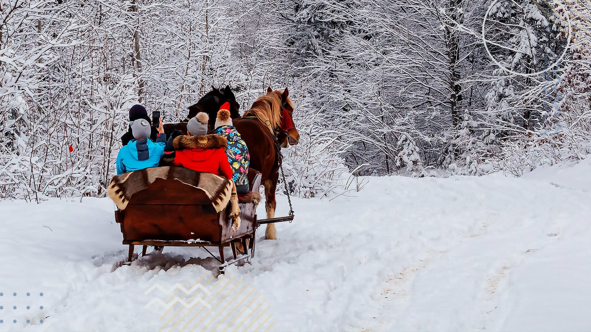 Family in horse carriage being pulled by horse on snow path