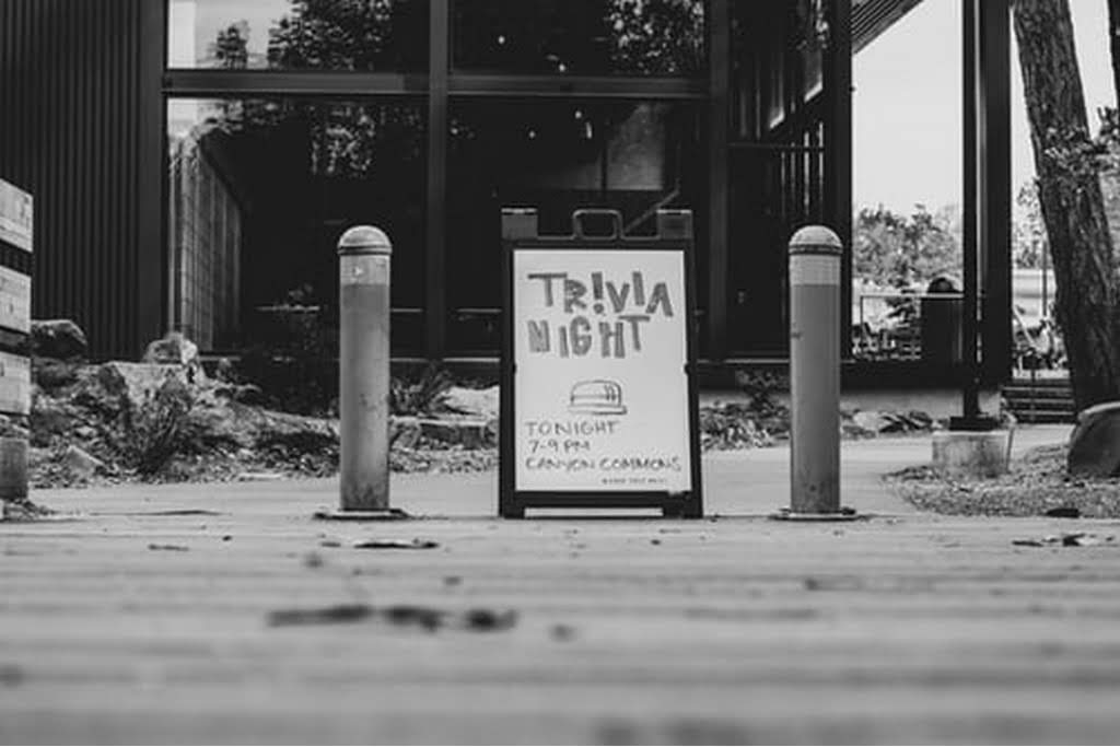sign showing a trivia night