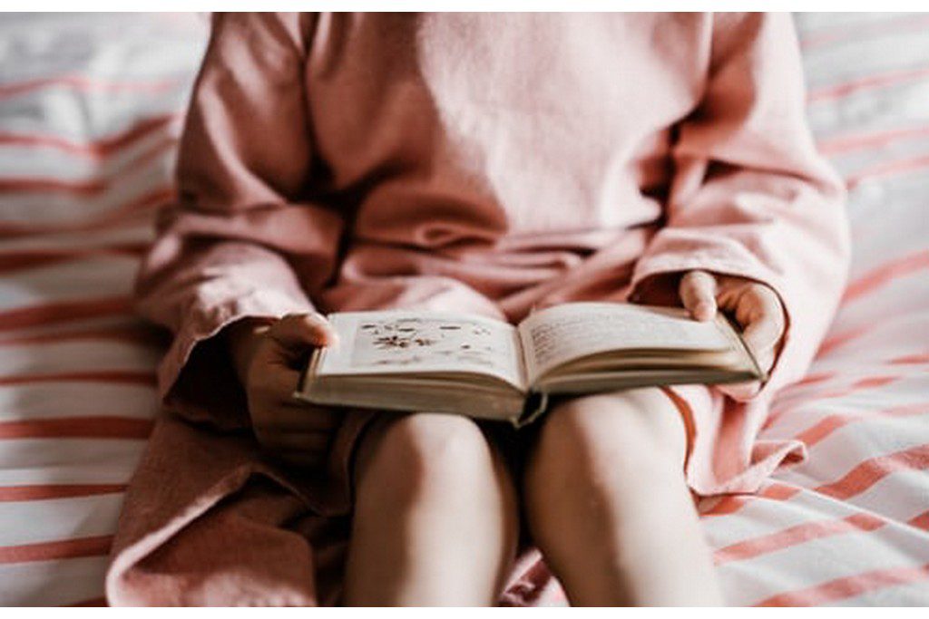 child reading a book