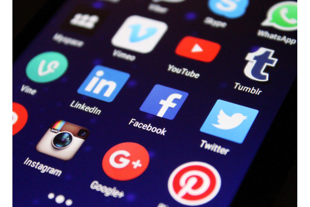 a close up of various social media apps to promote a cake sale on