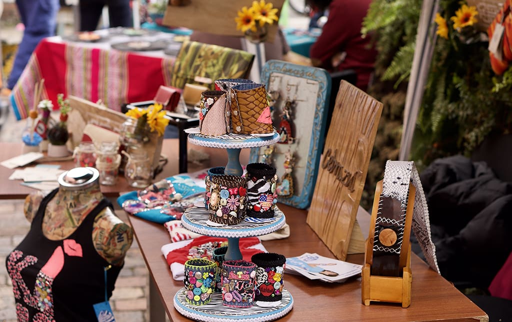 A booth set up to sell crafts at a school-sponsored vendor fair