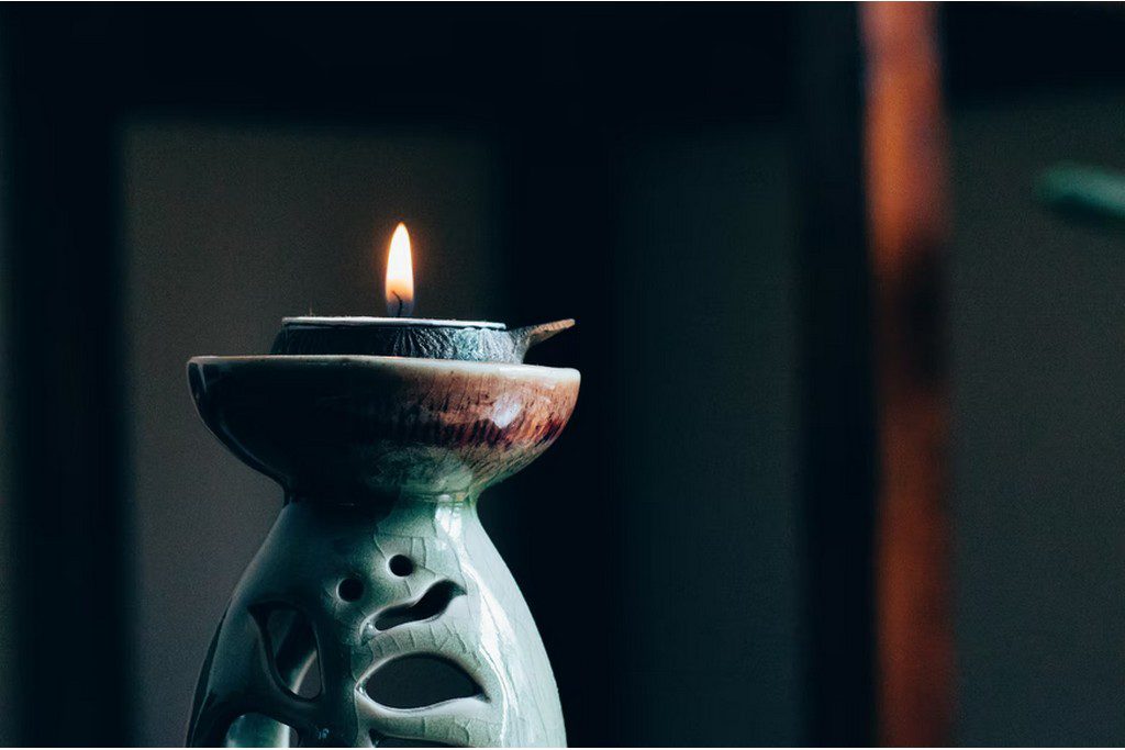 A candle in a candle holder