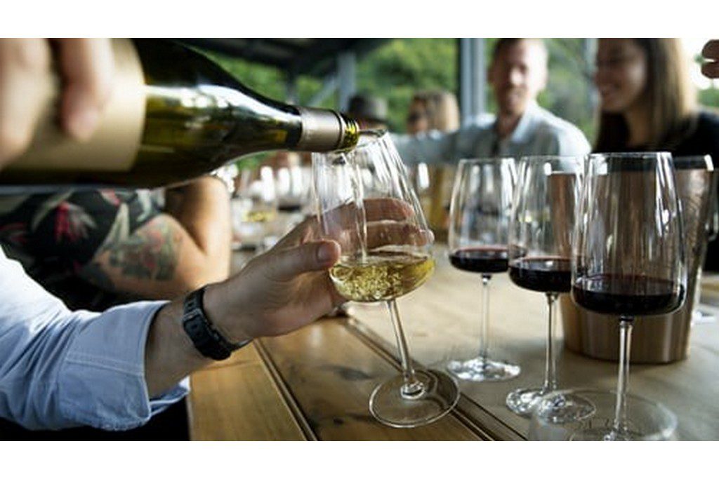 bartender pouring wine