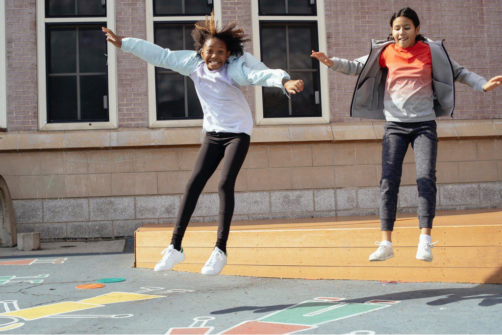 kids playing hop scotch