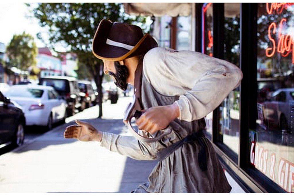 person in pirate costume in the street