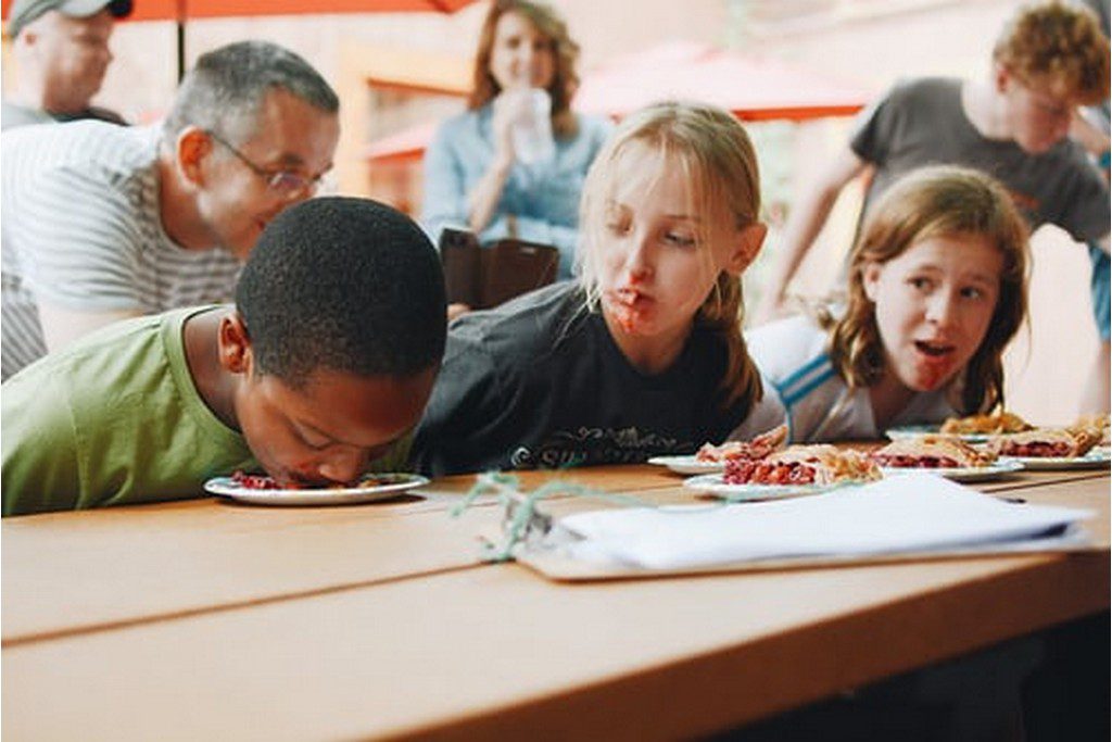 kids at a pie eating contest