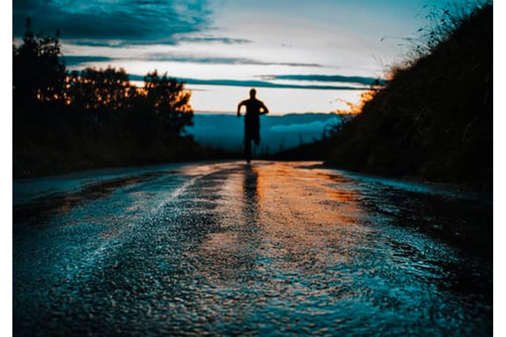 jogger jogging at sundown