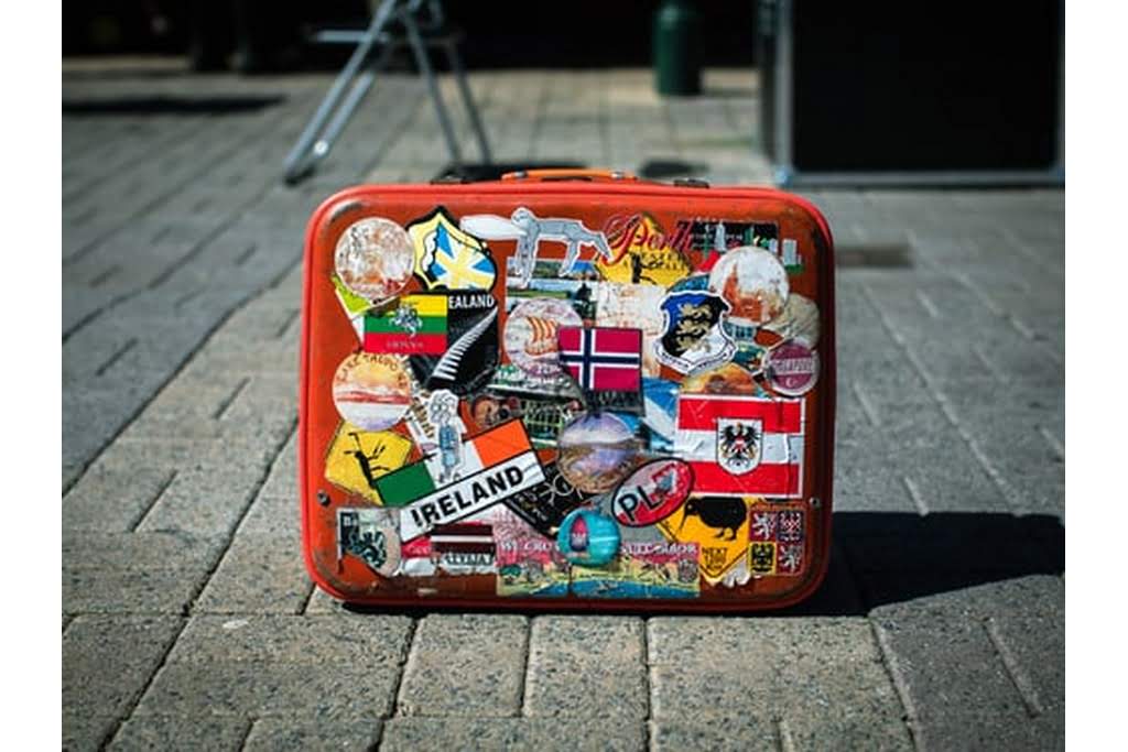 luggage with stickers