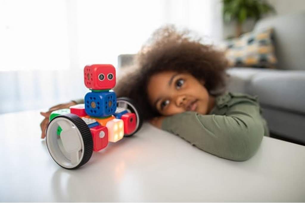 kid playing with toys