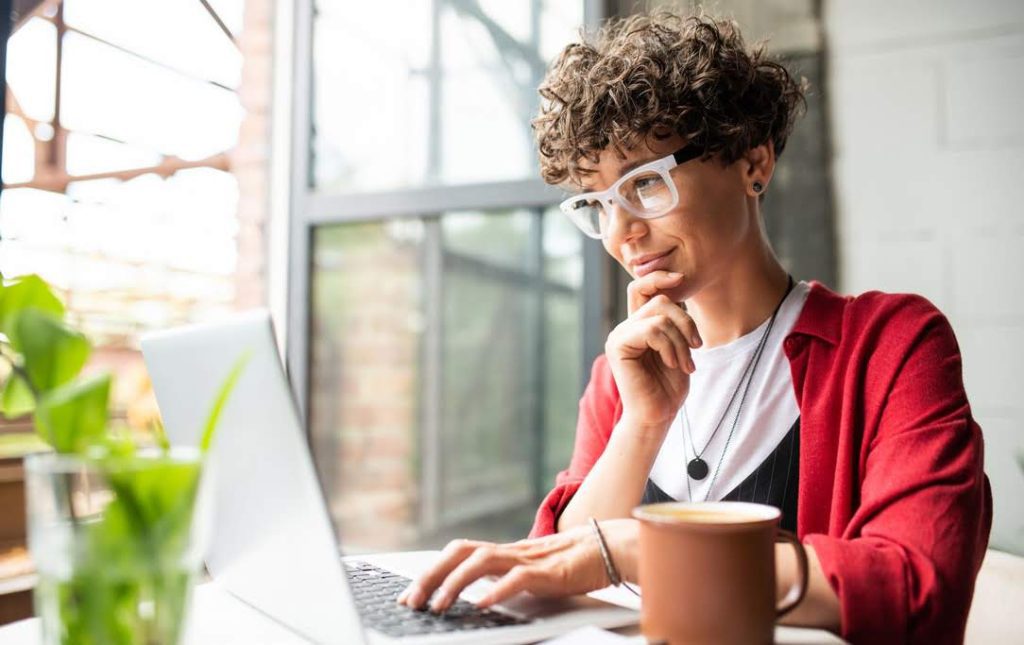 woman reading a e-newsletter