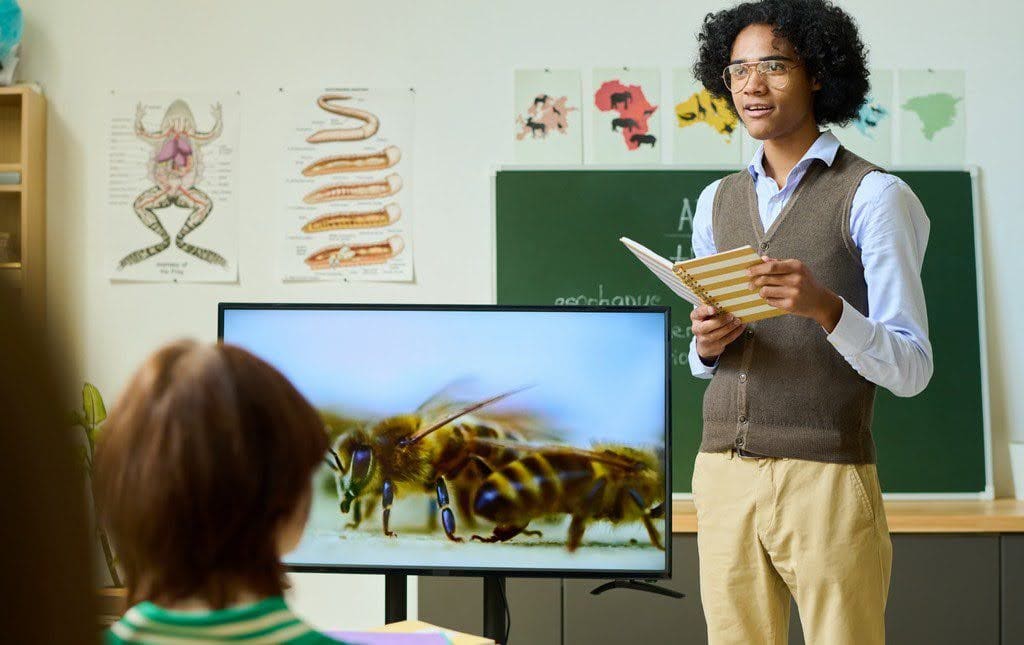 Kids practice for an upcoming spelling bee