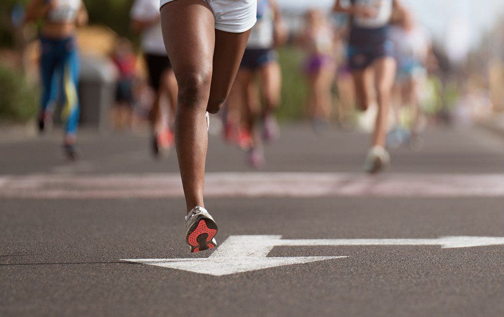 Students running during a jog-a-thon at school.