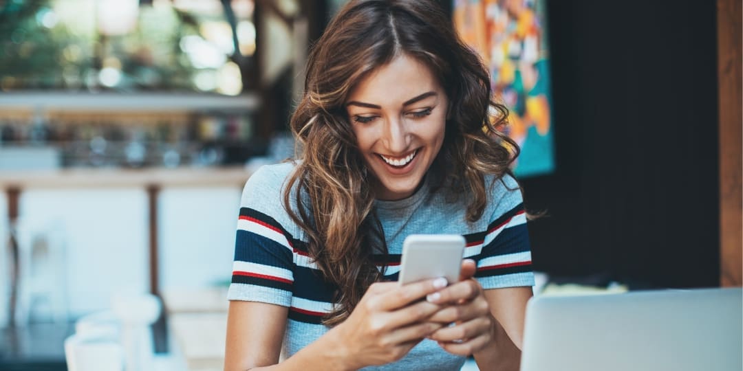futurefund-communicate woman receiving a text message<br />