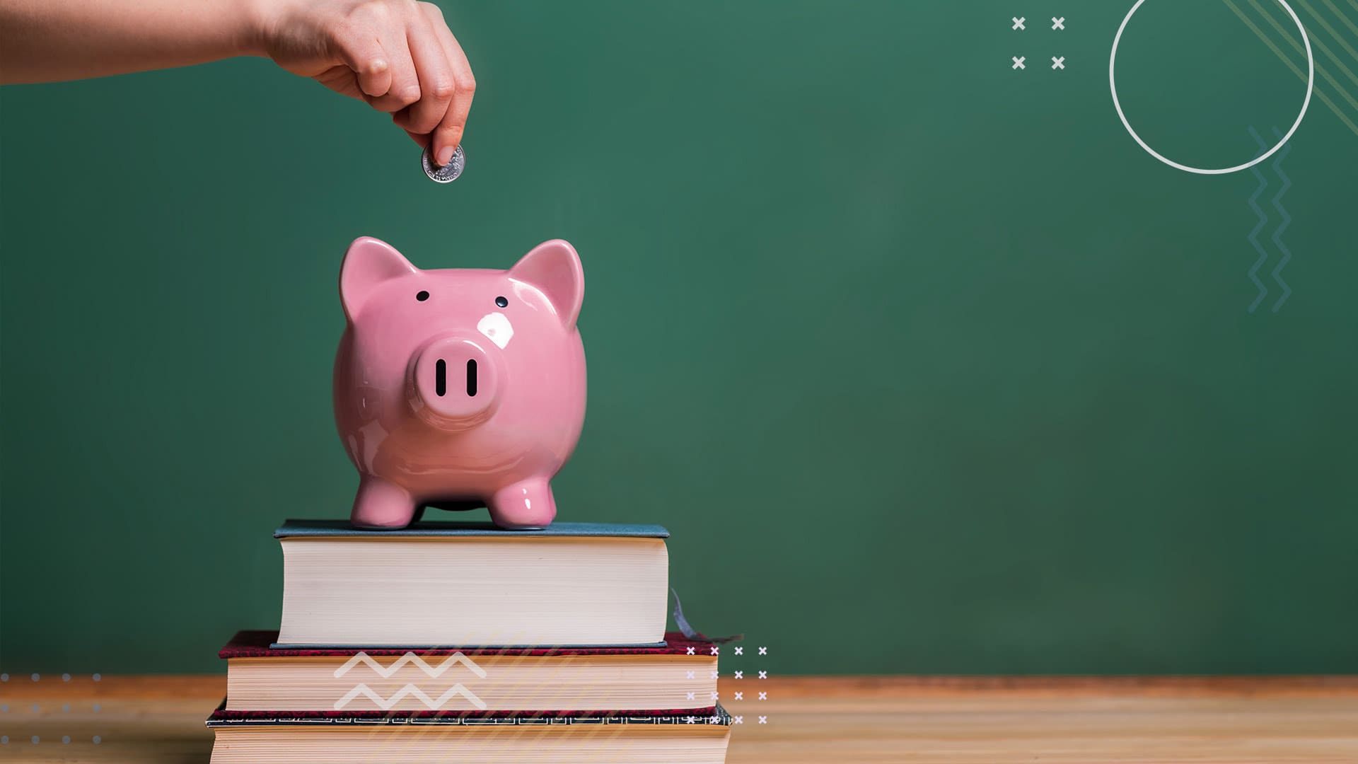 Child putting money into piggy bank