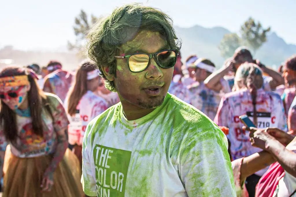 Participant in color run for school band fundraiser
