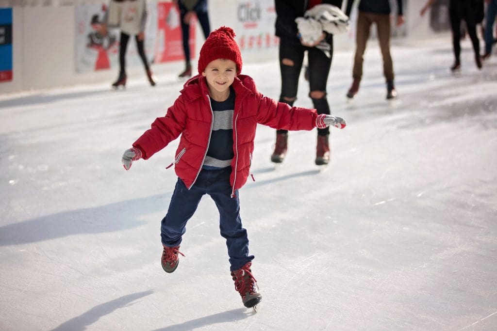School age child during ice skating fundraising event