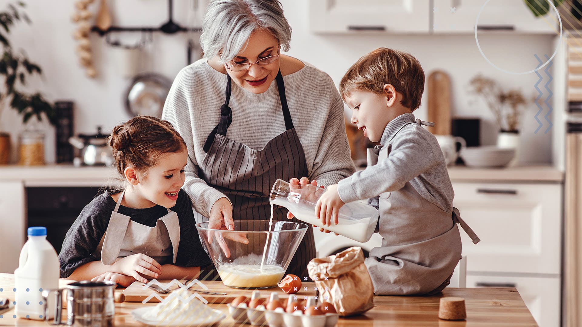 Elementary school students baking with teacher at bake sale