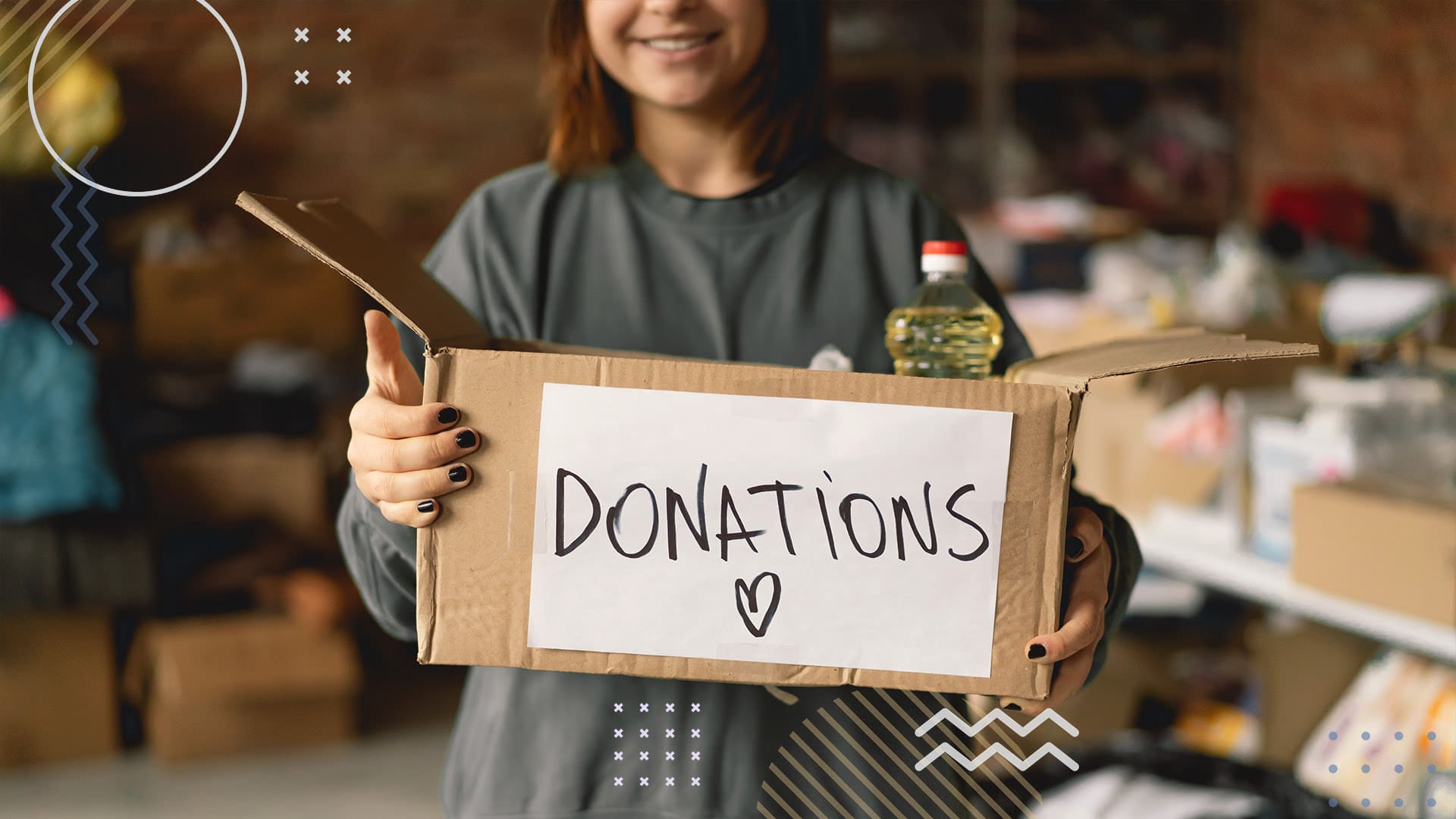 Student holding up a donation box with sign