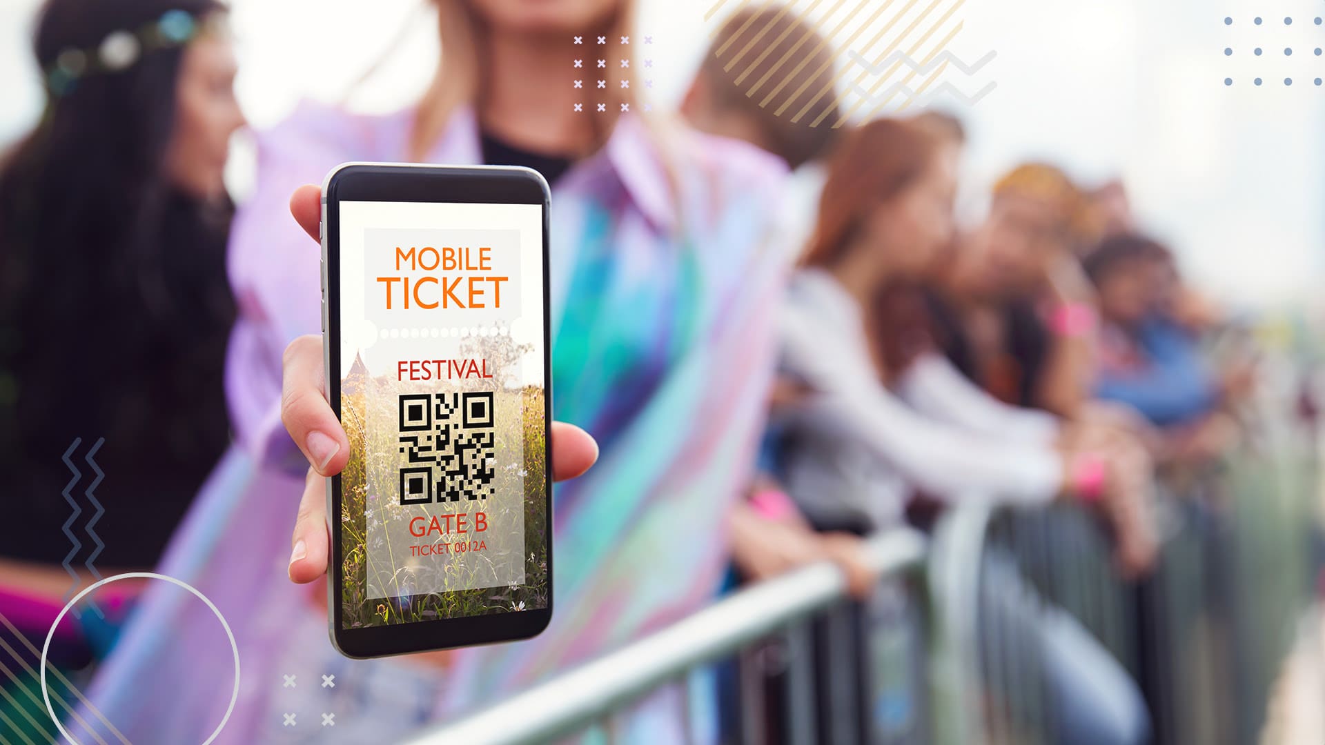 Person holding up smart phone with mobile ticket QR code